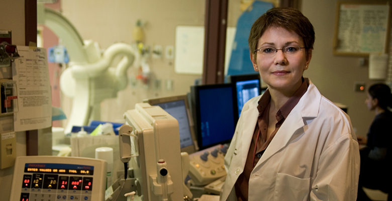CHÉOS Program Head of Cardiovascular Health Dr. Karin Humphries in medical lab, medical device clinical studies